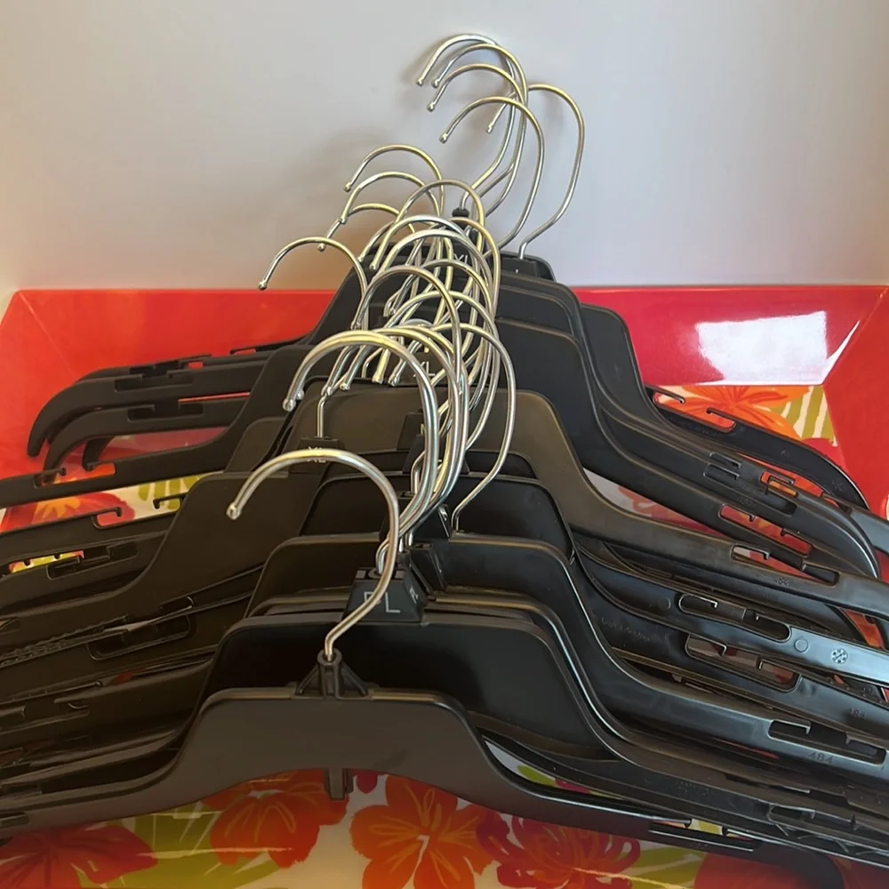 24 Black Retail Hangers with Silver Hook and All Can Add Another Hanger.